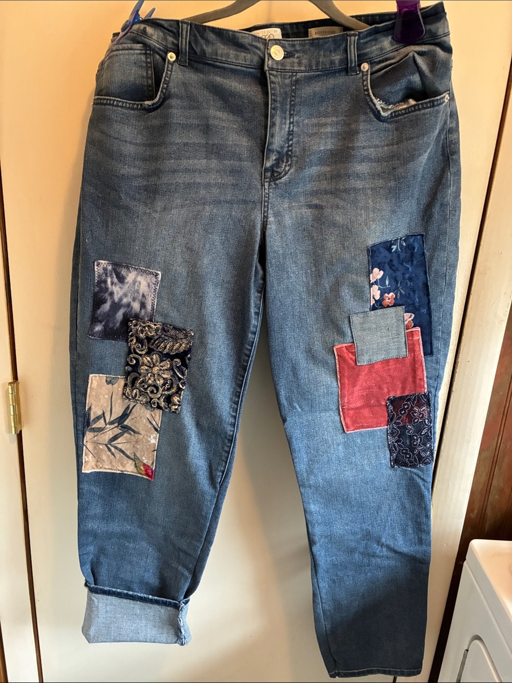Logo by Lori Goldstein patch jeans.